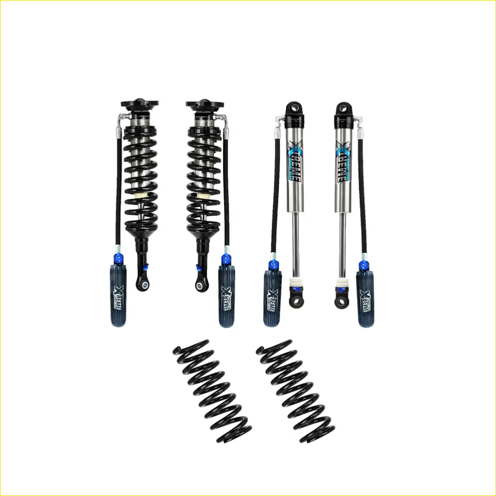 Set of four black and silver x-gear shock absorbers with blue accents and two black coil springs for lift kits in nz 2026