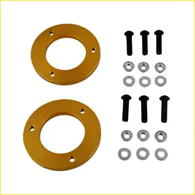 Gold-colored aluminium 10mm strut spacers with black bolts and silver washers for holden colorado rg lift kit