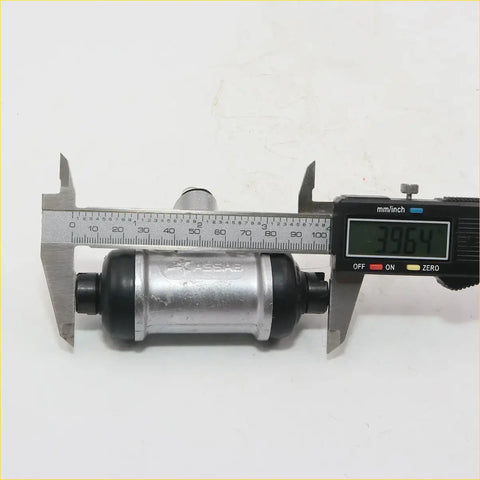 Silver and black matte rear brake cylinder hub bearing with engraved branding for nissan d21 navara ute 1986-1997