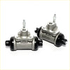 Silver and black 15/16 rear wheel brake cylinder with threaded fittings for nissan pathfinder terrano wd21 shown from back side