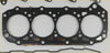 Black rubber head gasket with four circular openings and multiple small holes for master movano terrano patrol d22 engine