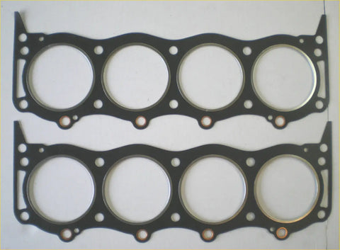 Black rubber engine head gaskets with four metal-ringed openings for land rover range rover discovery mg sd1 tvr