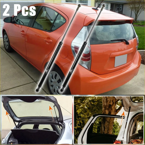 Black metal gas struts installed on orange toyota prius for rear boot lift support 2004-2007 model
