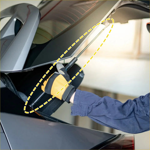Black and silver rear hatch lift support strut with long handle used to lift Toyota Sequoia trunk lid back side view