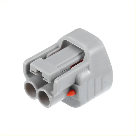 Gray plastic 2 x side marker light connector adapter kit with two circular ports and orange tab for toyota 4wd ute offroad
