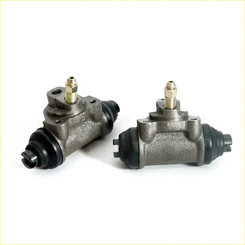 Gray metallic rear wheel brake cylinders with black rubber seals and brass fittings for datsun nissan 620 72-79