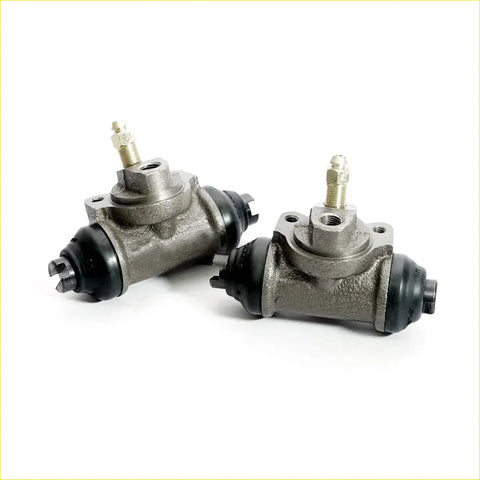 Gray metallic 3/4 rear wheel brake cylinder set with black rubber seals and brass fittings for nissan datsun 620 ute