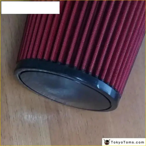 3 inch air filter with red pleated material and black plastic base for improved engine airflow and filtration