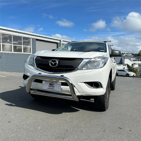 White mazda bt50 pickup truck with 304 stainless steel medium size chrome nudge bar from 2012 to 2020 model