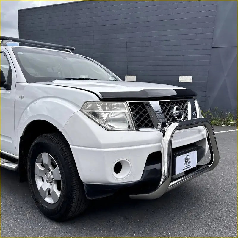 White nissan navara d40 with 304 stainless steel nudge bar chrome bull bar and black front grille for thai model