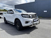 White nissan navara pickup with chrome 304 stainless steel nudge bar and black wheels for 2015-2020 models