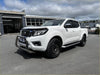 White nissan navara np300 with black wheels featuring a chrome 304 stainless steel nudge bar 2015-2020 model