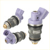 4 purple and gray fuel injector nozzles with metallic accents for Toyota Previa 1991-1996 shown from the back side