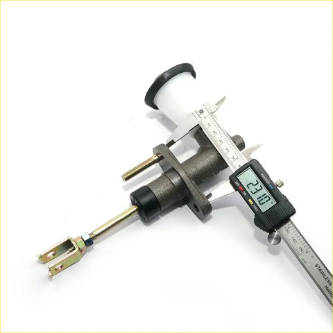 Gray metallic 5/8 clutch master cylinder with white plastic reservoir and black cap measured by caliper for Toyota Hilux