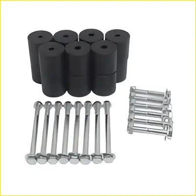 Black rubber cylindrical body lift kit blocks with silver metal bolts for 50mm raise on toyota hilux 1998-2004
