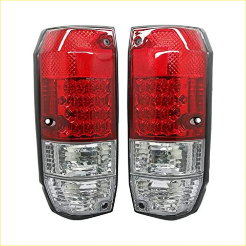 70 prado led tail lights x2 with red and clear textured lenses in black plastic housings mounted on the back side