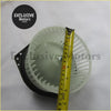 White plastic a/c blower motor with black mounting bracket for d-max lhd car cabin air system back side view