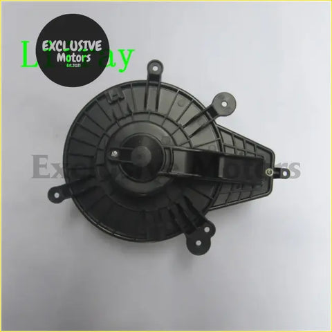 Black plastic A/C heater blower motor housing with mounting brackets for Nissan NP300 Navara D23 2.3 dCi 4x4 showing back side
