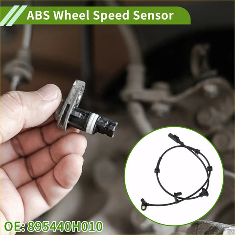 Black abs wheel speed sensor with metallic housing and coiled wiring shown in hand for Toyota Aygo rear right use
