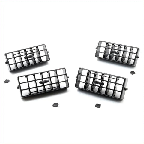 Black plastic rectangular air vents with grid pattern and spring for nissan datsun d21 1986-1997 back side view