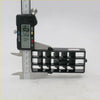 Black plastic air vent set with grid structure and screws being measured by caliper for nissan datsun d21 ute