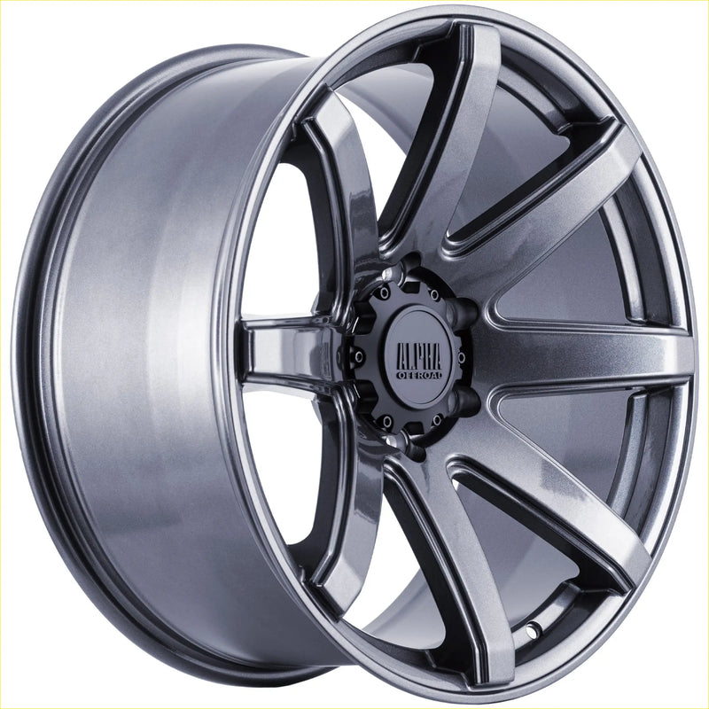 A sleek dark gray metallic alloy wheel with a multi-spoke design and alpha off-road center cap hyper grey model