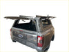 Gray ford ranger xlt pickup with black aluminium canopy carport cover and roof rack shown from the back side