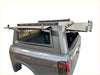 Gray metallic aluminium canopy carport cover with roof rack and side panels open showing cargo area for nissan navara back side