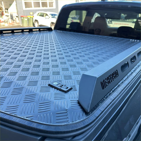Black diamond plate aluminium truck bed liner with non-slip surface and reinforced edges for toyota hilux hard lid back side