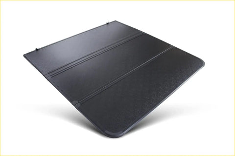 Black durable plastic truck bed cover with textured surface and reinforced seams for aluminium tri fold hardlid triton 2015+