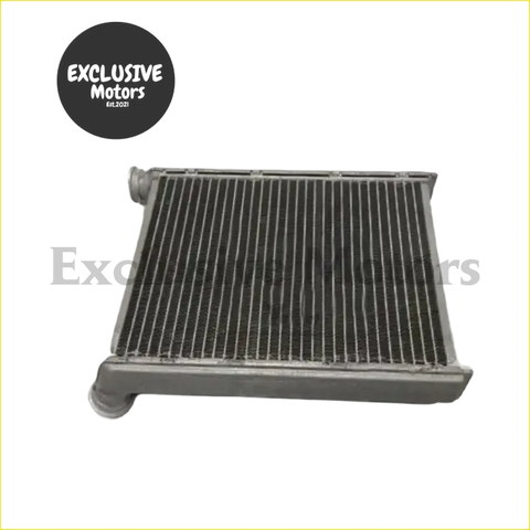 Silver aluminum heater core for Nissan X-Trail 2008-2014 with thin vertical fins and rounded end caps