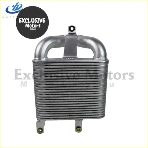 Silver aluminum intercooler with ribbed core and curved pipes for isuzu d-max 2002-2015 visible from the back side