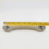 Beige plastic a-pillar grab handle with molded mounting brackets for toyota hilux sr5 2004-2016 showing back side