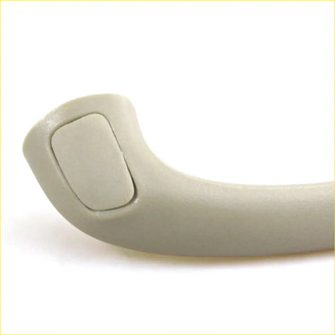 Beige plastic a-pillar grab handle for toyota hilux sr5 mk6 2004-2013 with smooth curved design and integrated button