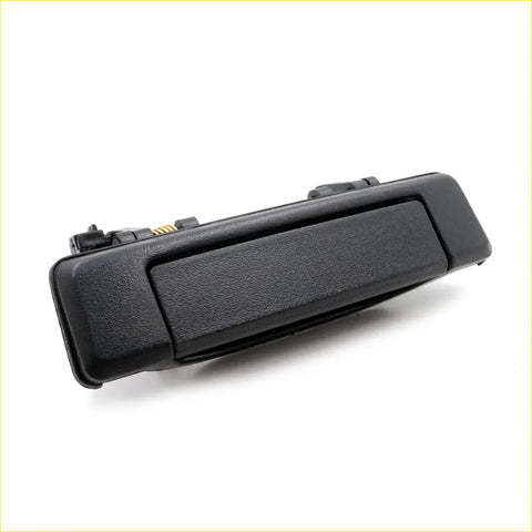Black exterior door handle for Mazda B Series B2000 B2200 B2600 with textured grip and integrated latch shown from back side