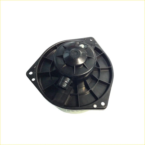 Black plastic blower motor housing with central fan and mounting holes for Nissan d22 Navara 2001-2015 back view