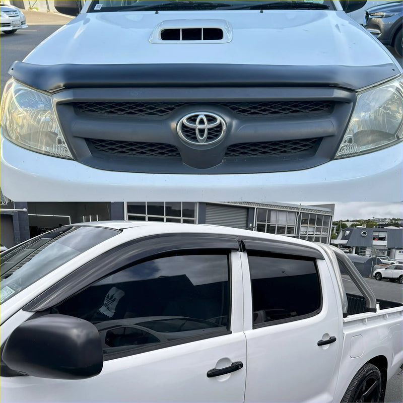 White toyota hilux pickup with matte black bonnet guard and black grille and window visors from monsoon for 2005-2012