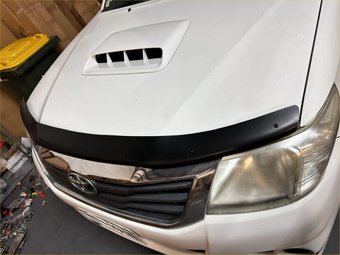 Black plastic matte bonnet guard on white monsoon toyota hilux 2012-2015 front bumper protector