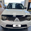 White mitsubishi triton suv with black bonnet guard protector stone guard and chrome grille 2005-2015 model