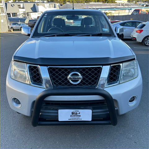 Silver nissan np300 pickup with black front bumper guard and chrome grille featuring bonnet guard protector stone guard