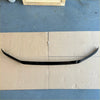 Black glossy rear spoiler with sleek curved design shown on the back side of bonnet guard protector for Toyota Land Cruiser LC300 2022+