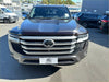 Dark metallic gray toyota land cruiser 300 with bold chrome grille and sleek led headlights featuring bonnet guard protector stone guard