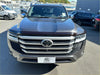 Dark gray metallic toyota land cruiser 300 with bold chrome grille and sleek led headlights featuring bonnet guard protector stone guard