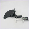 Black plastic bonnet lock hinge cover with sleek molded design and mounting brackets for Toyota Hilux models back side