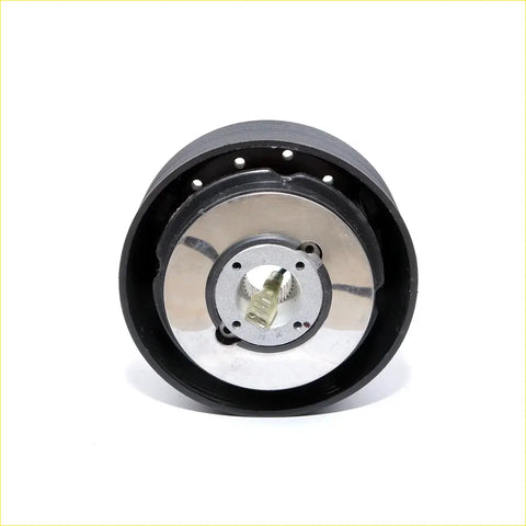Black rubber-coated boss kit steering wheel hub for Nissan Datsun 240Z with metallic center plate and mounting bolts visible