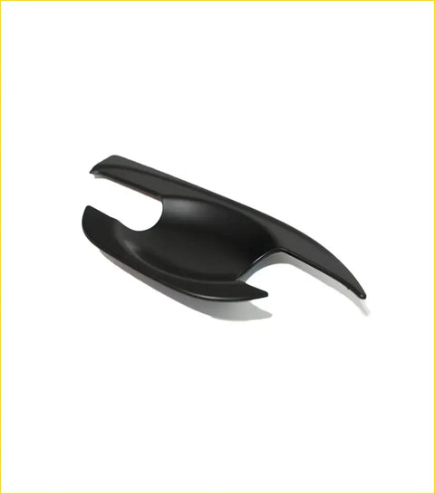 Black glossy plastic car door handle cover with sleek curved design for colorado trailblazer bowl inserts