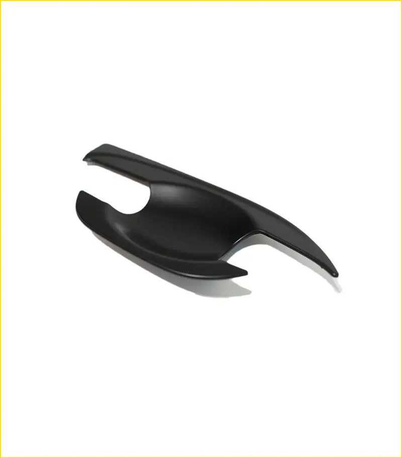 Black glossy plastic car door handle cover with sleek curved design for bowl inserts colorado trailblazer
