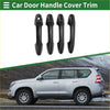Black carbon fiber textured car door handle cover trim for Toyota RAV4 2013-2018 shown from back side
