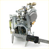 Silver carburetor with brass accents being measured with a digital caliper for mazda b1300 ford courier use