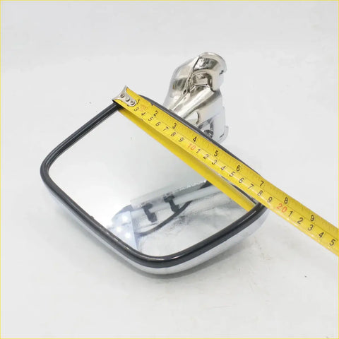 Chrome door mirror for toyota hilux 5th gen 1988-1997 with chrome finish black trim and elephant-shaped mount shown from back